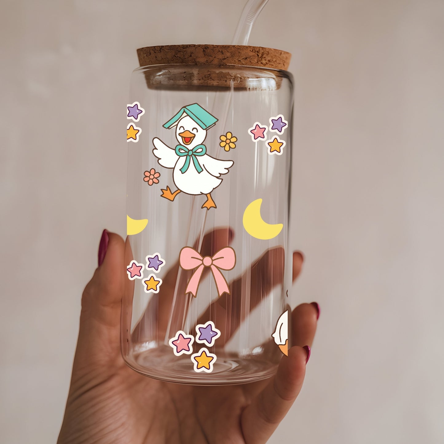 The Cosy Bookish Goose 16 oz Glass Tumbler with bamboo lid and glass straw.