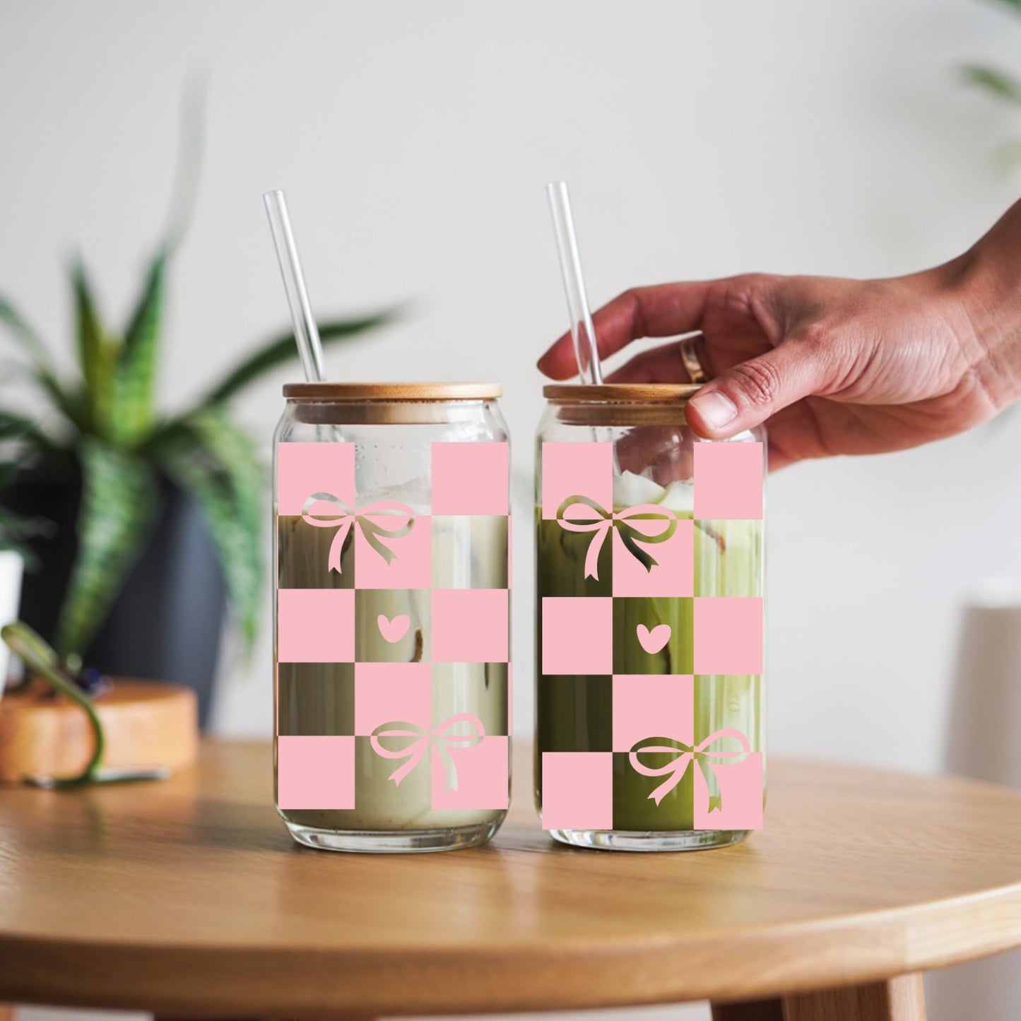 Chequered Coquette Bows And Hearts 16 oz Glass Tumbler with bamboo lid and glass straw.