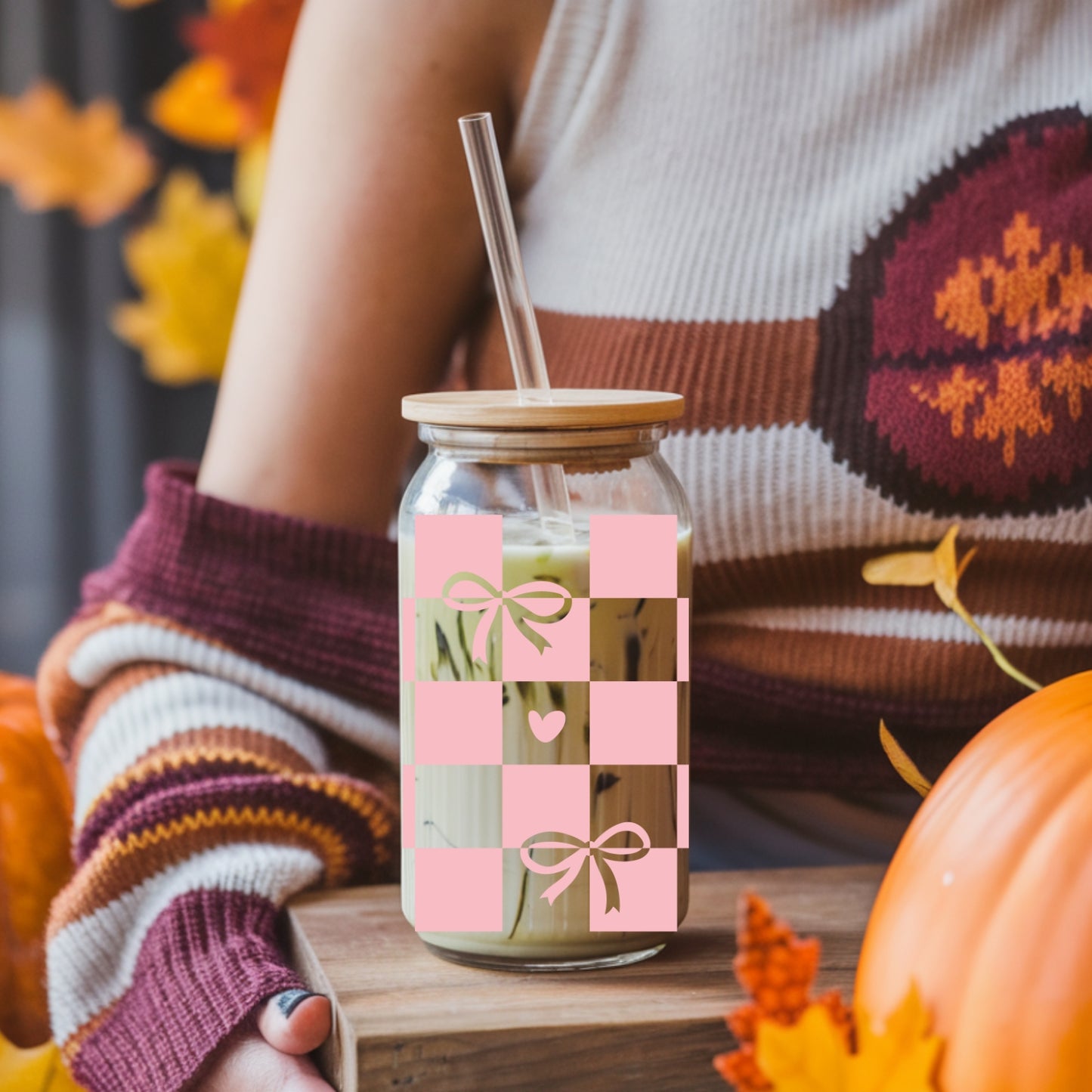 Chequered Coquette Bows And Hearts 16 oz Glass Tumbler with bamboo lid and glass straw.