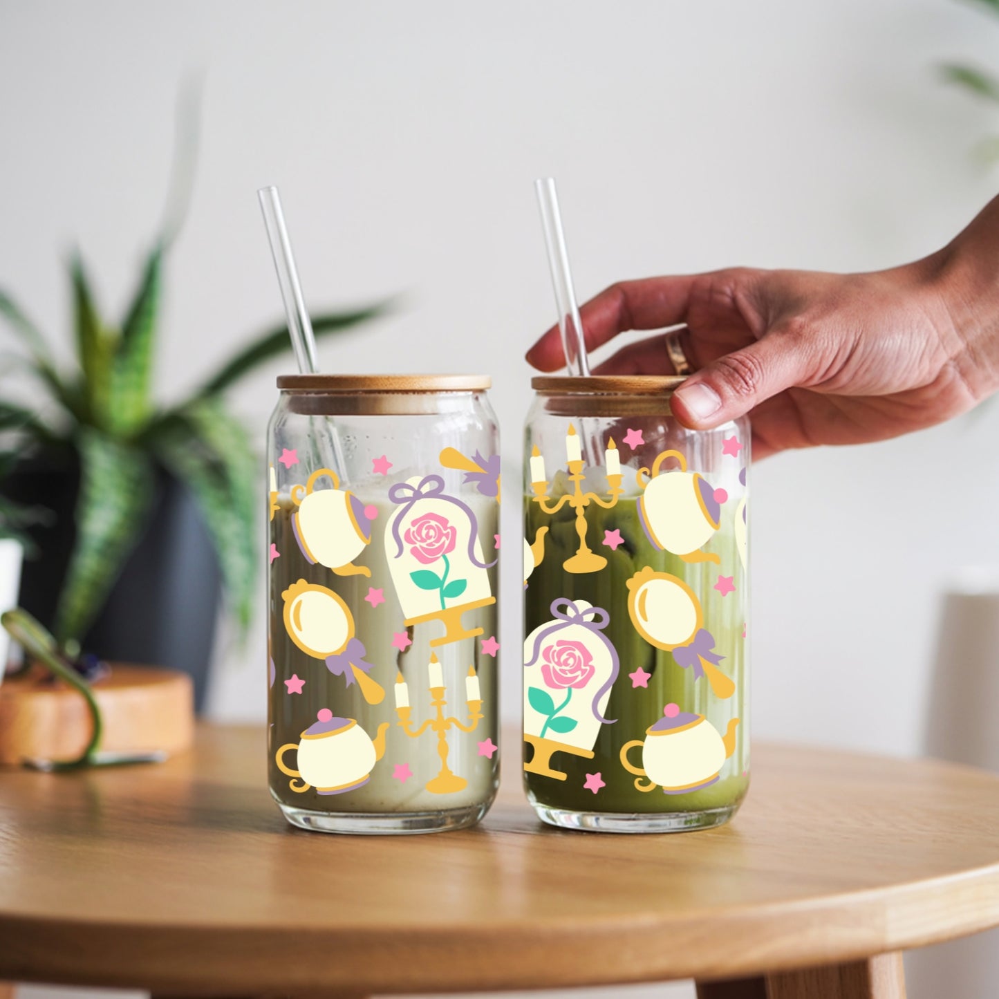 Princess 16 oz Glass Tumbler with bamboo lid and glass straw.
