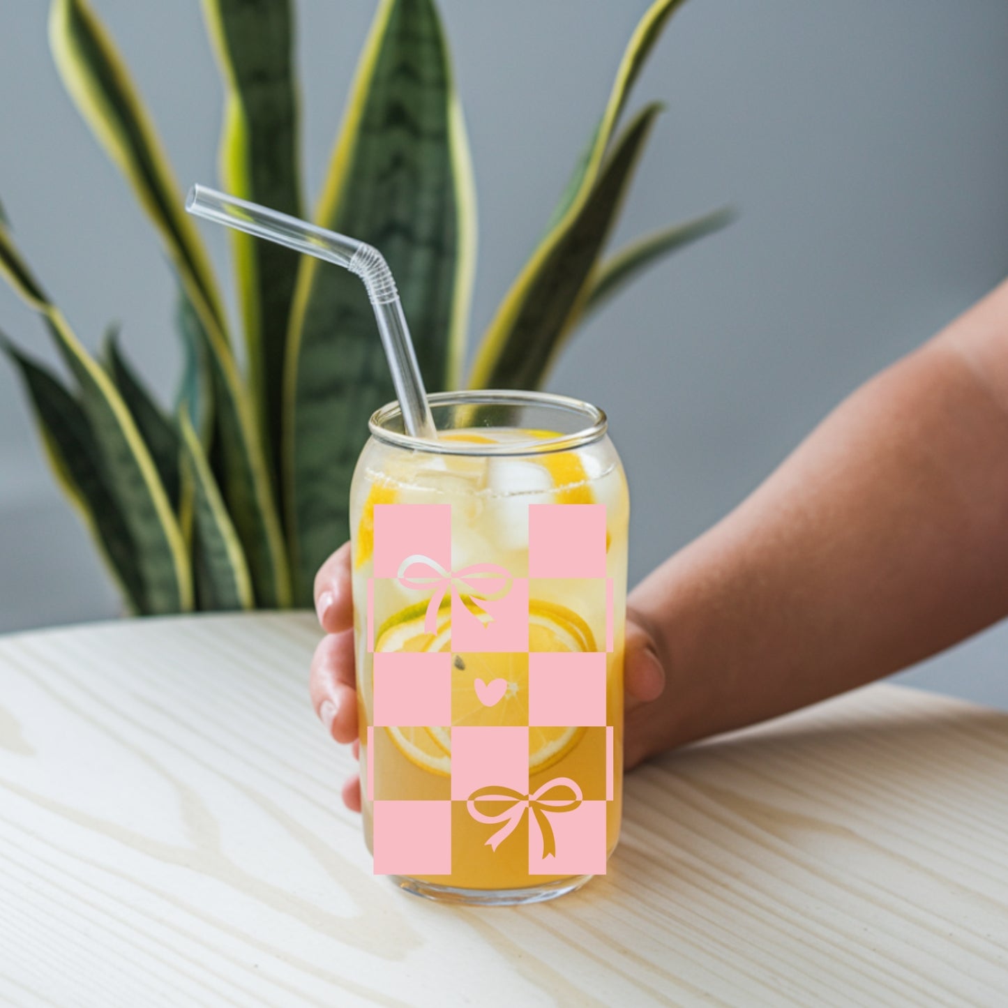 Chequered Coquette Bows And Hearts 16 oz Glass Tumbler with bamboo lid and glass straw.