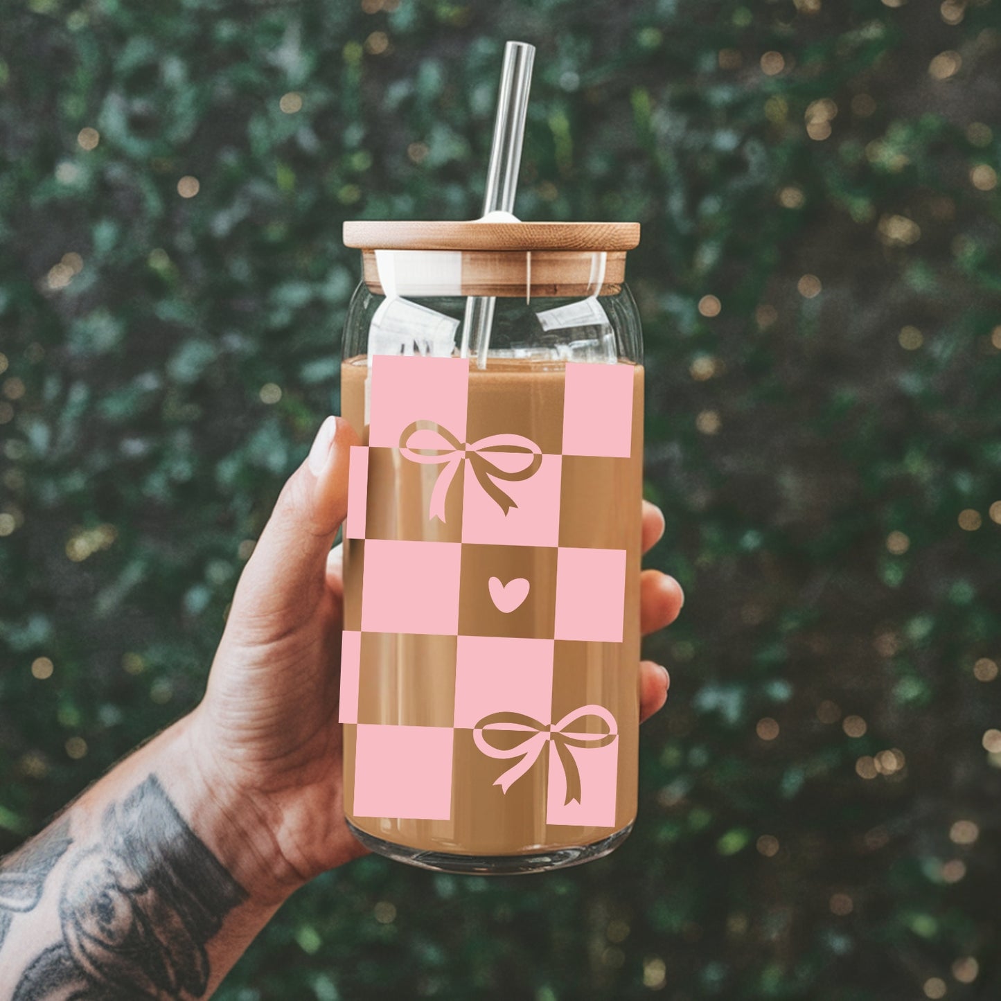 Chequered Coquette Bows And Hearts 16 oz Glass Tumbler with bamboo lid and glass straw.