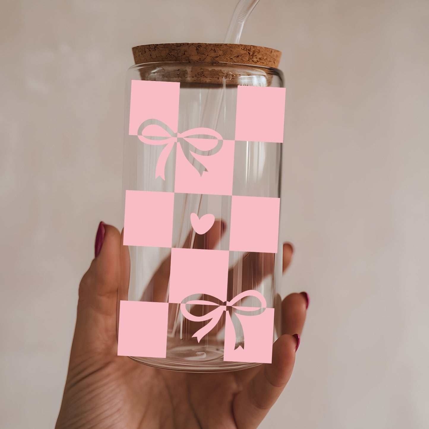 Chequered Coquette Bows And Hearts 16 oz Glass Tumbler with bamboo lid and glass straw.